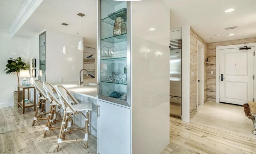 This classy renovation in the heart of Rosemary Beach Town Center, enjoys the close proximity to the vibrant entertainment venues of Restaurants & Shops as well as the privacy and quiet of a well insulated structure. The balcony overlooks Barrett Square Park with views of the West Indies inspired architecture of the Town Center buildings and Town Hall. Enter the Foyer with  whitewashed pecky cypress walls and French sconces, then progress to the expansive Living/Dining adjacent to the Italian Kitchen with a Wolf/Subzero appliance package. Each of the 3 Bedrooms are in separate corners of the condo allowing further seclusion. The renovation also included marble baths, built-ins, new plumbing, electric and refinished floors throughout.