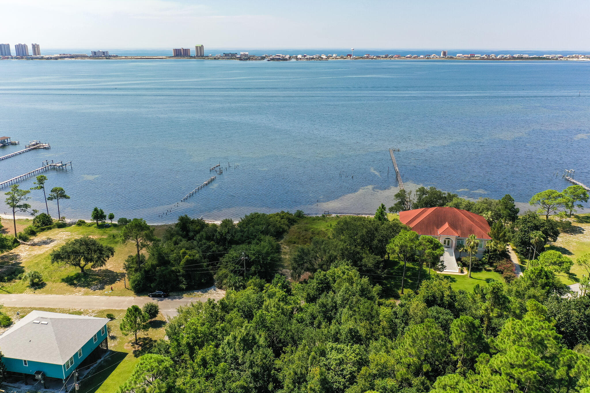 Prime WATERFRONT location! Exceptional lot with 101 feet of sound frontage. Spectacular view! Don't miss your opportunity to build your dream home on one of the few remaining large lot in this peaceful neighborhood without HOA. It's a boater's paradise! Come enjoy an array of dolphins swimming in your own backyard! Almost half of a acre with old majestic oak trees. Private with county own property across the street.Tap fee paid. Conveniently located near shopping, schools, beaches and 20 min from Hurlburt Field.