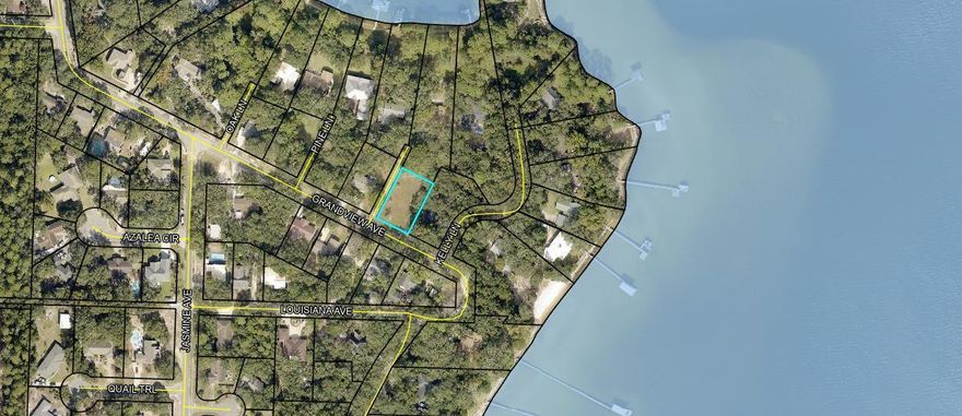 Discover the perfect canvas for your dream home on this idyllic vacant land located in the Valparaiso Shores community! This prime piece of real estate offers endless possibilities for outdoor enthusiasts and nature lovers spread over 0.30 acres. With nearby access to lush parks, you'll enjoy leisurely strolls, picnics, and a serene escape into nature. Additionally, the convenience of nearby boat launches provides easy access to endless aquatic adventures. Don't miss out on the opportunity to create your own oasis in this desirable location - seize the moment and turn your vision into reality!