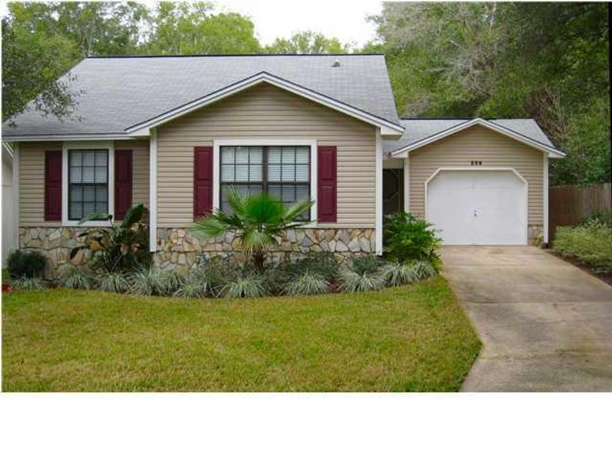 Cute home in a great location. close to some of the most highly rated schools in Florida! It's rare to find a home at this price point in Niceville. The focal point of the great room is the stone fireplace flanked by windows providing a light filled warmth to the space. An eat-in kitchen with bay windows adds to the charm. The master bedroom has a vaulted ceiling and double sinks in the adjoining master bath. Come take a look today!