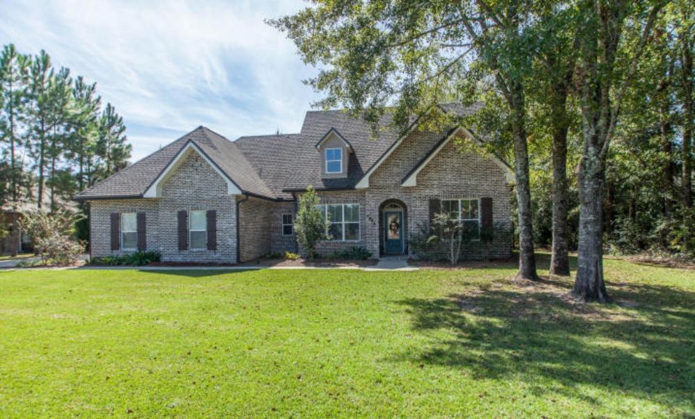 Move in Ready Home on a large level lot! Upgrades Galore! Great Open Floor Plan! The kitchen features a large center island, a walk in Pantry, and stainless appliances! Granite countertops throughout the home, beautiful hand scraped hardwood floors, upgraded oil rubbed bronze finished hardware and light fixtures. 9 FT ceilings, custom crown molding, Tiled shower in the master bath with frameless shower door. One bedroom could be a possible MIL suite with it's own private bathroom. Spray foam insulation in the attic for energy savings. Gutters! Sprinkler system front and back! Shadow box 6' Privacy fenced backyard. Covered patio for outdoor entertaining. Great location near BAYA and Baker Arena with an easy commute to nearby shopping, Beaches or Eglin AFB, Duke Field and 7th Special Forces.