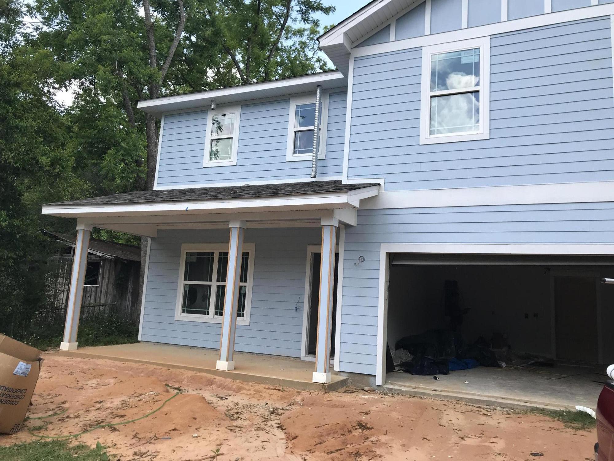 This lovely home is NEW! Built in 2019. Four bedrooms 3 baths with an attached two car garage. Granite counter in the kitchen and baths. Super sized Livingroom and kitchen combined. Upstairs are the very generously designed bedrooms. Master bedroom has a to die for en suite with large soaking tub and glass shower and separate toilet room. Within walking distance to the lake yard and downtown DeFuniak Springs!