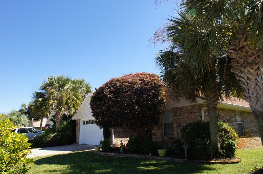 A nice 4 bedroom, 2 bath brick home in the Seaspray neighborhood! This residence features tiled flooring throughout the main living area, wood flooring in the bedrooms, high vaulted ceilings and a private patio area for outdoor enjoyment. A great location close to the community pool, shopping, restaurants, golfing and all of the entertainment of Destin, Sandestin and 30A! This would be a great second home or permanent residence.