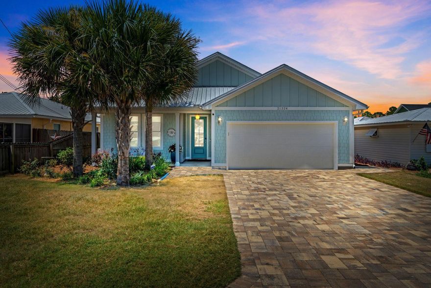 Located in the desirable Riviera Beach neighborhood on the west end of Panama City Beach, this thoughtfully designed 3-bedroom, 2.5-bath home offers the ideal blend of style, comfort, and convenience--just 2 blocks from the beach. Built in 2022, the home features an open-concept layout filled with natural light, a modern coastal color palette, and quality finishes throughout. The kitchen is well-appointed with ample storage and seamlessly connects to the main living and dining areas, making entertaining effortless. Enjoy your own private backyard retreat with a saltwater pool, paver patio, and tropical landscaping--perfect for relaxing or hosting friends and family. No HOA and can be short term rented