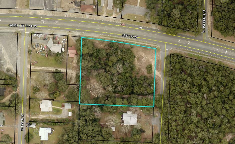 Great location for this almost 2 acres of land on Highway 90 W. This is a corner location with 310 on Hwy 90. There is a 1550 SF Home on the property that is currently rented and will give you some income while you plan your development of the property. Lease expires 4/30/2021. $900 per month rent. Dimensions are approximate. 2624 SF includes: 1550 SF 3 Bedroom/2 Bath home, 612 SF attached Garage, 60 SF unfinished storage, and 402 SF in Porches. Zoning and Future Land Use are Mixed Use allowing for both Commercial and Residential development.