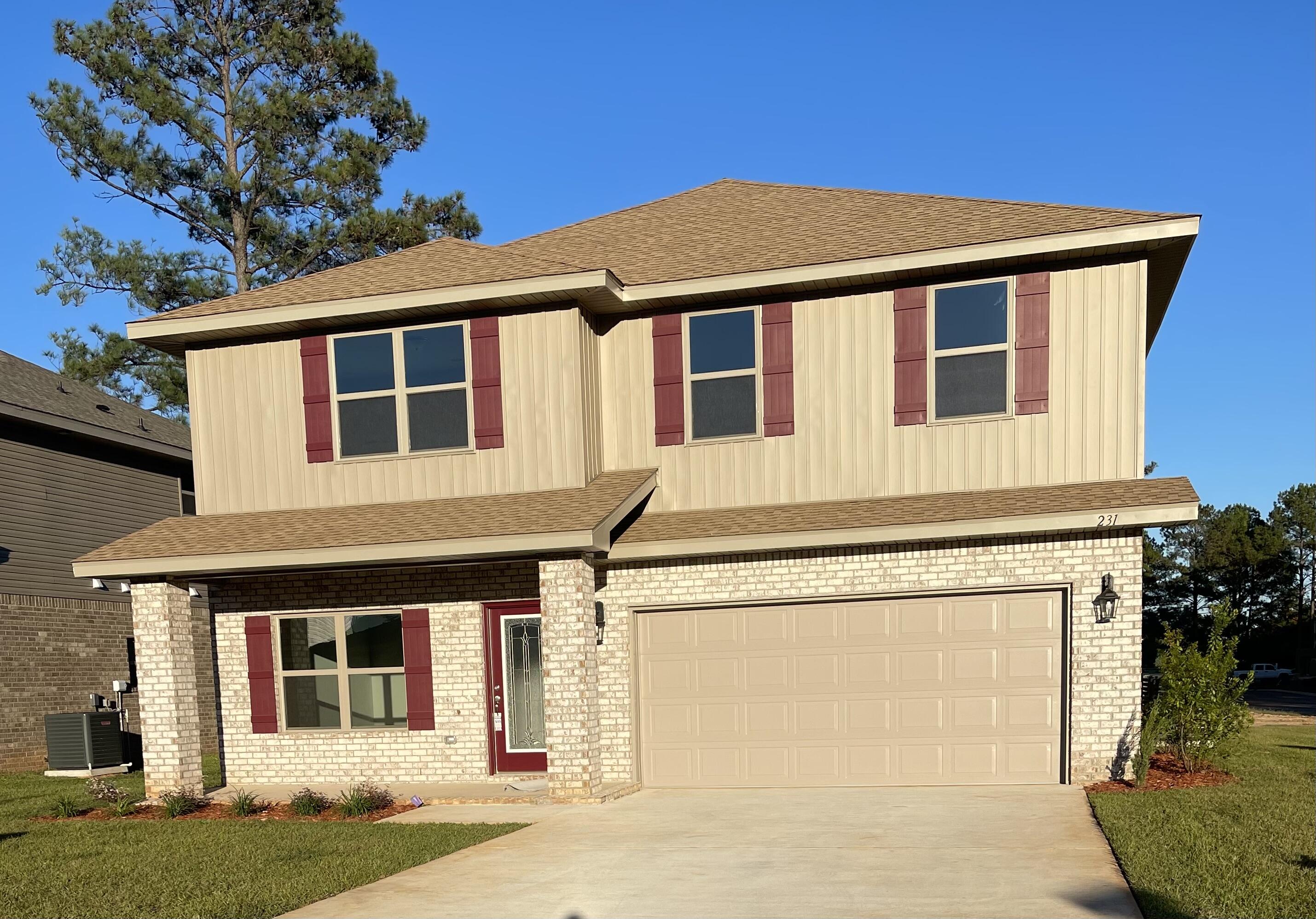 This traditional style two story 4 sided brick home has 6 bedrooms with 3 1/2 Baths as well as a bonus room and spacious master suite. The master bedroom is on the first floor and boasts a master bath with a separate shower and garden tub. All countertops have been upgraded with granite as well as the kitchen and other bathrooms. The kitchen has a center island that looks out to the family room. All other bedrooms are upstairs with the bonus room and laundry. Floors are upgraded with durable LVP throughout except for the bedrooms and stairs which are carpeted. The exterior is fully sodded and landscaped. Sprinklers and an electric garage door are just to name a few of the many features in this home. The home comes with a 10 yr Bonded Builders Warranty.There is a community pool as well.