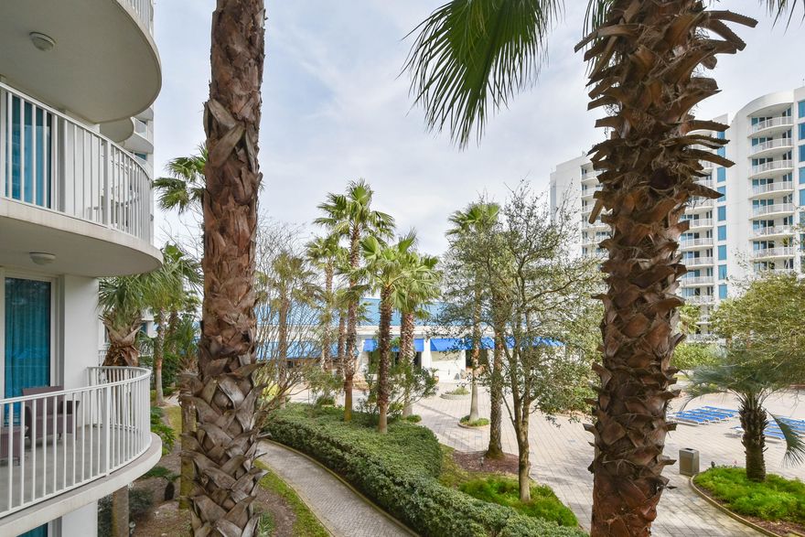 This 2nd floor, junior two-bedroom condo offers views overlooking the pool area. It has an open concept living and dining area, as well as an expansive and inviting balcony just perfect for taking in the serenity of the pool. Enjoy the many onsite amenities, including a lushly landscaped pool area boasting Destin's largest lagoon pool with waterfall features, a kiddie pool, hot tub, and splash pad, as well as a playground, fitness center, and tennis and basketball courts. Want your toes in the sand? The resort offers complimentary shuttle service to the beach for you to enjoy Destin's world famous sugar-white sand and emerald-colored water beaches. Shuttle service takes you to the June White Decker Public Beach access which is just minutes away.