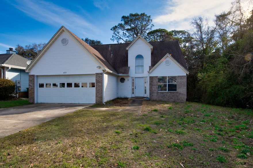 Welcome to Managua Way! Sought after community close to Hurlburt AFB and the beaches of the Emerald Coast. This home is a 3 bedroom 2.5 bath, over 1500sqft, two level home that is the second largest corner lot located in Colina Del Oro. On the Main level you have the living room with wood burning fireplace, master bedroom and master bathroom, kitchen, and proper dining room that could be used as a flex space. The main level also features a half bathroom and under stair storage area. On the second level are twin bedrooms and a full bathroom. Opportunity for Customization awaits you at 473 Managua Way, roll up your sleeves and make it your own! This home is being sold AS IS and is a fixer upper. Buyer to verify all information deemed important.