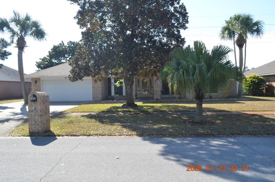 Making this your ''change of address'' gives you the opportunity to be 2-1/2 blocks from the beautiful Destin Beach!With this fantastic location comes: *2,200 sq ft of an all-brick-construction ranch! *3 bedrooms, 2/1/2 bathrooms. * A bonus room just off the entry can be an office, separate dining room, or an additional bedroom. *Spacious Great Room that easily accommodates family and friends for visiting and dining with a brick wood burning fireplace. *Great Room opens to an oversized Garden Room, filled with natural light, overlooking your own salt-water pool. *Garden Room has access to a screened-in-patio. *Privacy at rear of lot -75' easement behind *Large Lot-80'x100' *2- car garage *Small, friendly neighborhood that is a NON-HOA community-well maintained.  *Emerald Breeze subdivision is city-restricted to long-term rentals.
 *Original owner has meticulously maintained the property.
 *New roof, new water heater, new HVAC-all less than a year old.
 *Pergo flooring in foyer, Great Room, and Office (bonus room). Tile in kitchen and bathrooms.
 *Hurricane shutters included.
This is a wonderful opportunity to have a move-in ready home...close to the beach...convenient to shopping, dining, banking...easy access to main roads...yet be in a quiet neighborhood with your own piece of Florida paradise!
