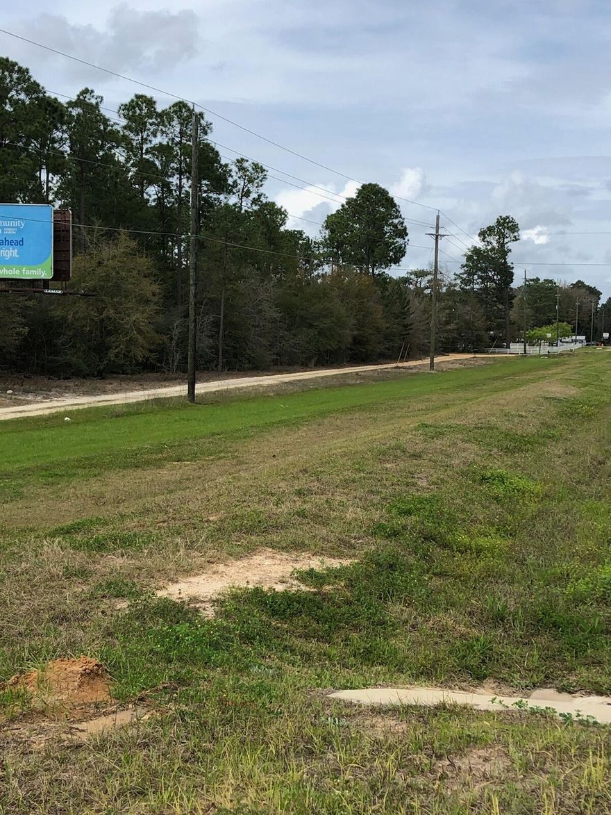 This is a PRIME LOCATION on HWY 331 S, being situated just South of the NEW Industrial Park and in a growing area. It is zoned Commercial with Residential Use as sellers now live on the property.  Partially wooded.