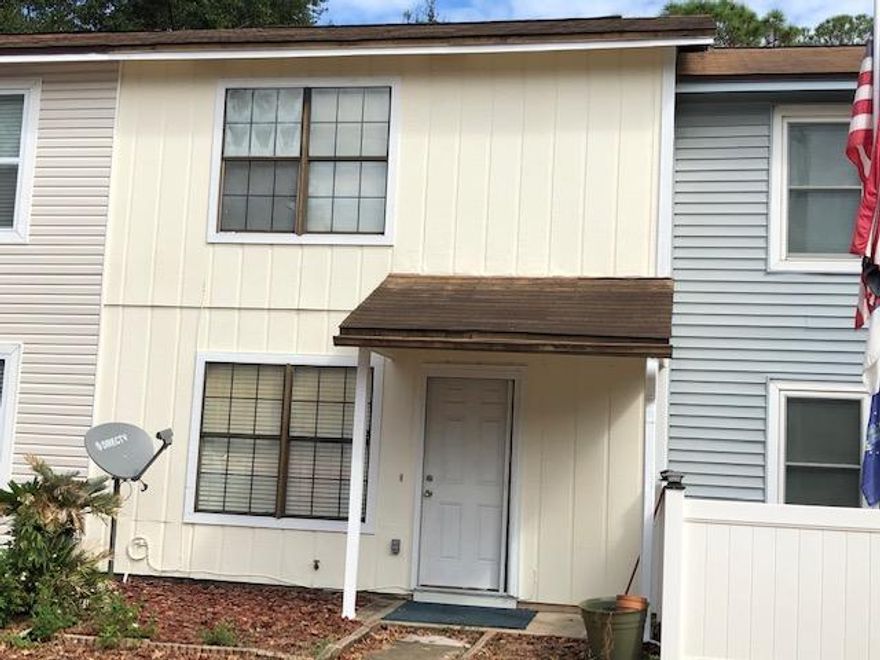 Investors take note - tenant in place (month to month). Updated town home close to Hurlburt Field, Eglin AFB, beaches, colleges, shopping, etc. Stainless steel appliances, newer hand scraped wood laminate downstairs and tile floors. French patio doors w blinds, updated kitchen and bathrooms, closet organizers. Don't miss the outdoor space, laundry and storage area off of the kitchen.