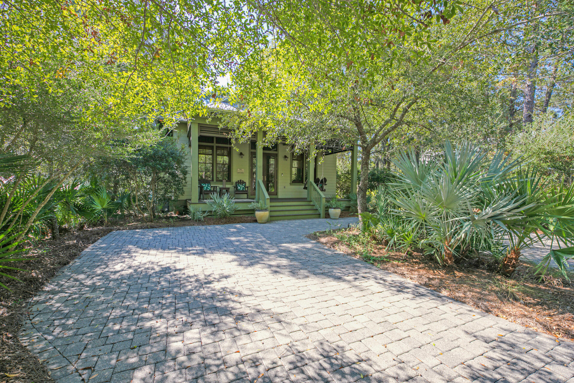 UNDER CONTRACT, TAKING BACK UP OFFERS! The gated & highly coveted Hammocks of Seagrove is perfectly tucked away from the hustle & bustle of 30A yet still just a short stroll to the beach, Watercolor, dining & all things Seaside! This IMMACULATE beach home has NEVER been rented and pride in ownership shows! True custom build design throughout with shiplap walls, maple hard wood flooring, built-in closets, modern open floor plan and marble countertops. This home comes furnished with exquisite furnishings, art & upgrades! Long day at the beach? Relax in privacy on the expansive, fully screened in back porch. Within the Hammocks, you'll find TWO community pools, canal access AND allowance of short term rentals! Enjoy this lush green getaway for personal use, 2nd home escape or rental Property