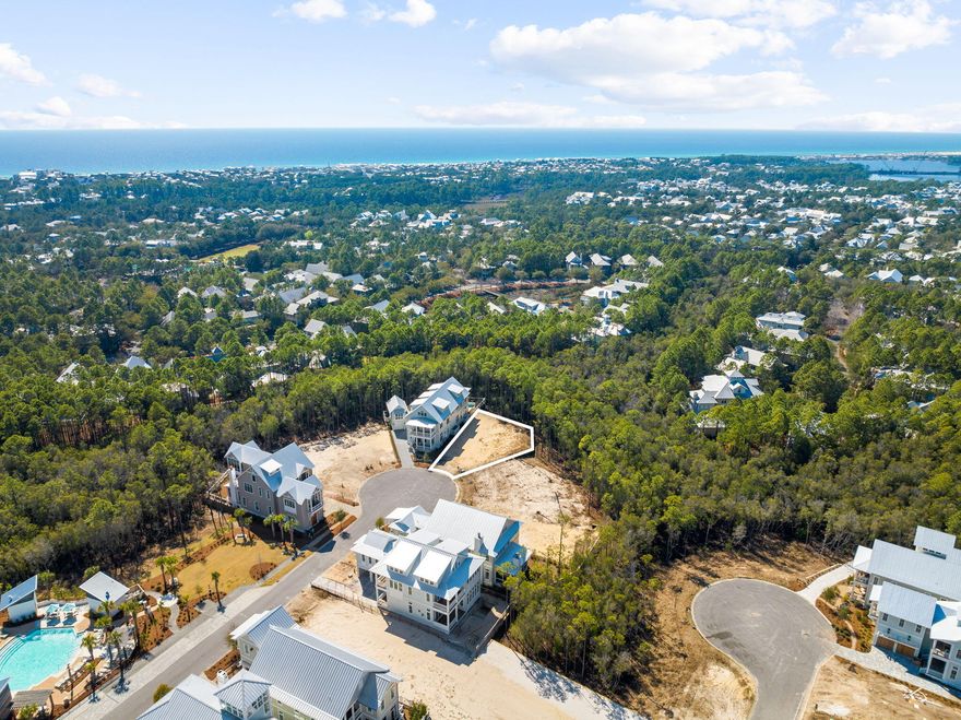Discover an unparalleled opportunity to build your dream home in the prestigious Park District of Watercolor, Phase V. Lot 37 is a premier homesite, ideally situated at the end of a quiet cul-de-sac on String Lily Cove. This exceptional property offers privacy and tranquility, with a greenbelt behind it and a 20-ft-wide greenway easement between it and the adjacent lot to the right. A completed home on the left further enhances the setting. This shovel-ready lot comes with fully approved and entitled architectural plans designed by Chris Stoyles of Archiscapes, along with all necessary Walton County permits, allowing you to break ground immediately. The current plans feature a stunning 5-bedroom, 7-bathroom home spanning 5,270 sqft of heated/cooled space, plus over 1,300 sqft of covered balconies and porches. The design includes a private pool, a summer kitchen, and an outdoor living area complete with a fire pitensuring the ultimate indoor-outdoor coastal lifestyle.

Phase V is Watercolor's final and only short-term rental-restricted phase, ensuring a peaceful residential atmosphere. Residents also have access to an exclusive community pool available only to the owners of the 41 homesites within the phase.

As a Watercolor homeowner, you'll enjoy exclusive access to world-class amenities, including the Watercolor Beach Club, featuring three Gulf-front pools, cabanas, a tiki bar, and dining options. Camp Watercolor offers a family-friendly water park with slides, a lazy river, and a casual dining area. Outdoor enthusiasts will appreciate direct access to Western Lake for kayaking and paddle boarding. The community's extensive trail system, lush parks, and beautifully landscaped common areas provide endless opportunities for recreation and relaxation.

This is a rare opportunity to secure one of the most desirable homesites in 30A's largest master-planned community. Don't miss your chance to own a piece of paradise in Watercolor.

For more details or to schedule a site visit, contact us today.