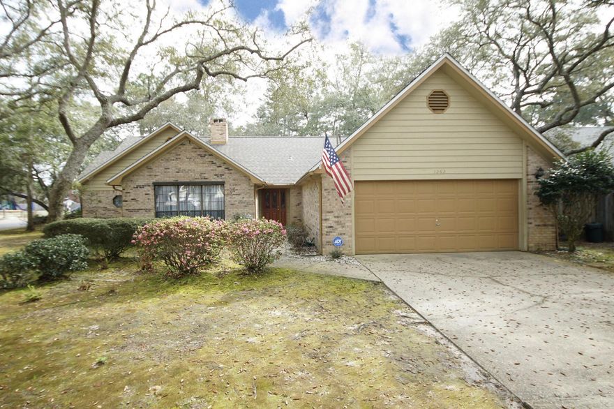 Incredible Buyer Opportunity: This home comes with an assumable VA loan at an ultra-low 2.5% interest rate. This is a rare chance to take advantage of significant savings in today's market. Welcome to this beautiful 3-bedroom, 2.5-bath home situated on a spacious .42-acre corner lot adorned with stunning oak trees. Located in the highly desirable Bluewater Bay community, this property offers the perfect blend of comfort, space, and natural beauty. Step inside to find a split floor plan with a warm and inviting living area featuring a gorgeous fireplaceperfect for cozy evenings. The kitchen offers plenty of counter space, a bright breakfast room filled with natural sunlight, and a convenient countertop bar for casual dining. The formal dining room is ideal for hosting family and friends. 

The spacious master suite features a double vanity and a relaxing garden tub, providing the perfect private retreat. Additional highlights include a new roof installed in 2022 and a huge yard perfect for outdoor activities, gardening, or simply enjoying the peaceful surroundings under the shade of mature oak trees. 

 

 