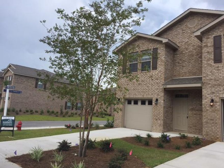 Beautiful brand new townhome at Reserve Pointe in Navarre, Florida. This 3BR/2.5BA townhome has a definite ''wow'' factor. From the moment you enter, you'll be amazed with the craftsmanship and decadent touches found throughout the space. This includes granite counter tops in the kitchen and bathrooms, stainless steel appliances, beautiful fixtures and flooring. Downstairs you will find the main living areas and a conveniently placed half bath. The bedrooms have been placed upstairs for additional privacy. The backyard area offers a nice patio area that is perfect for summer barbecues and cookouts.
Reserve Pointe is one of Navarre's newest communities and comes with a range of amenities for residents. This includes a playground, community pool, picnic tables and deck space. Lawn care is included in the rent. This rental is pet friendly with approval and deposit.