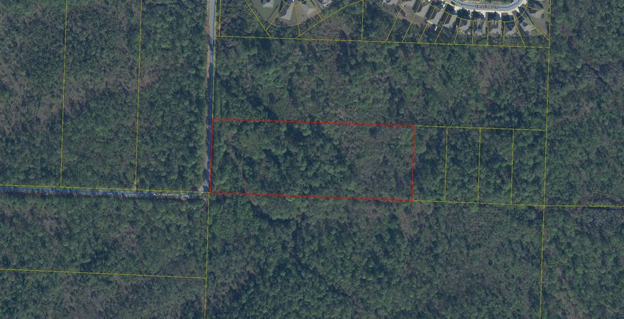 Don't Hesitate! This 8 Acre Parcel will not stay on the market long. Priced to SELL! Parcel is located North of Hwy 98, in close proximity to SanDestin on a paved road. Utilities are in area (water/sewer and electric).  Property located just before Eagle Bay Landing. Walton County Parcel Map shows as Conservation Residential zoning which means you could build 2 homes per acre. Price is FIRM. Call today, this one won't last!