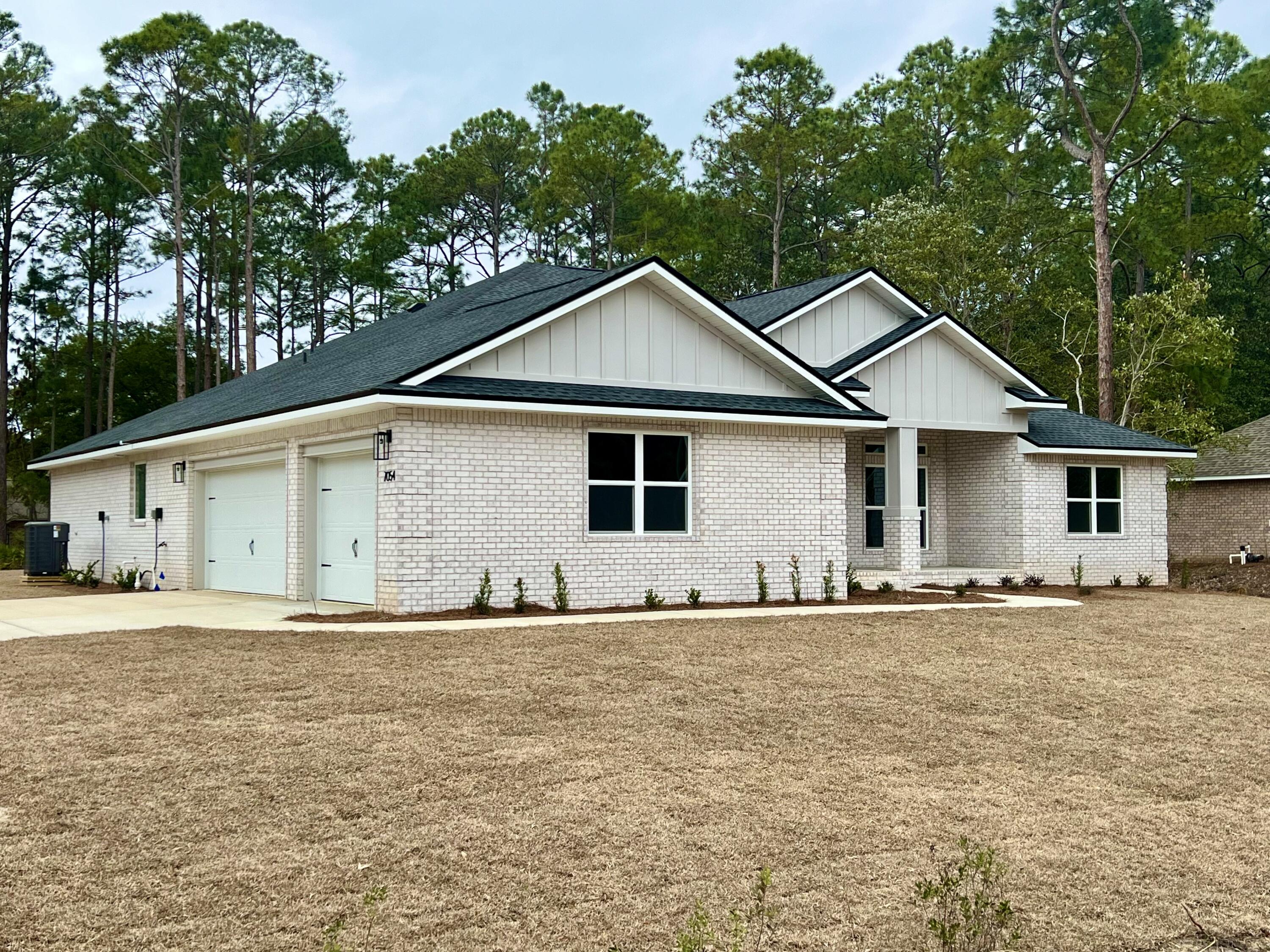 NEW Custom Built Home in Holley By The Sea,Enjoying all the Club House amenities including :Pools,Fully Equipped Gym,Tennis Courts,Waterfront Park & Deeded Access to Santa Rosa Sound .This luxurious 4 bed/3 bath Tri split floor plan is estimated to be complete late Sept 25 ~Desirable Corner Location within HBTS..with easy access to Navarre Beach, shopping and Hwy 98 to Hurlburt Field AFB.This Stunning Robbins Builders Custom Home~offers trend setting design & features~Greeted by a walk in foyer open to the Formal Dining and Office with double glass doors/sweeping through to your open floor plan ~Large Gourmet kitchen enjoying shaker cabinets with crown molding beautiful Quartz counter tops~Tiled Back splash~