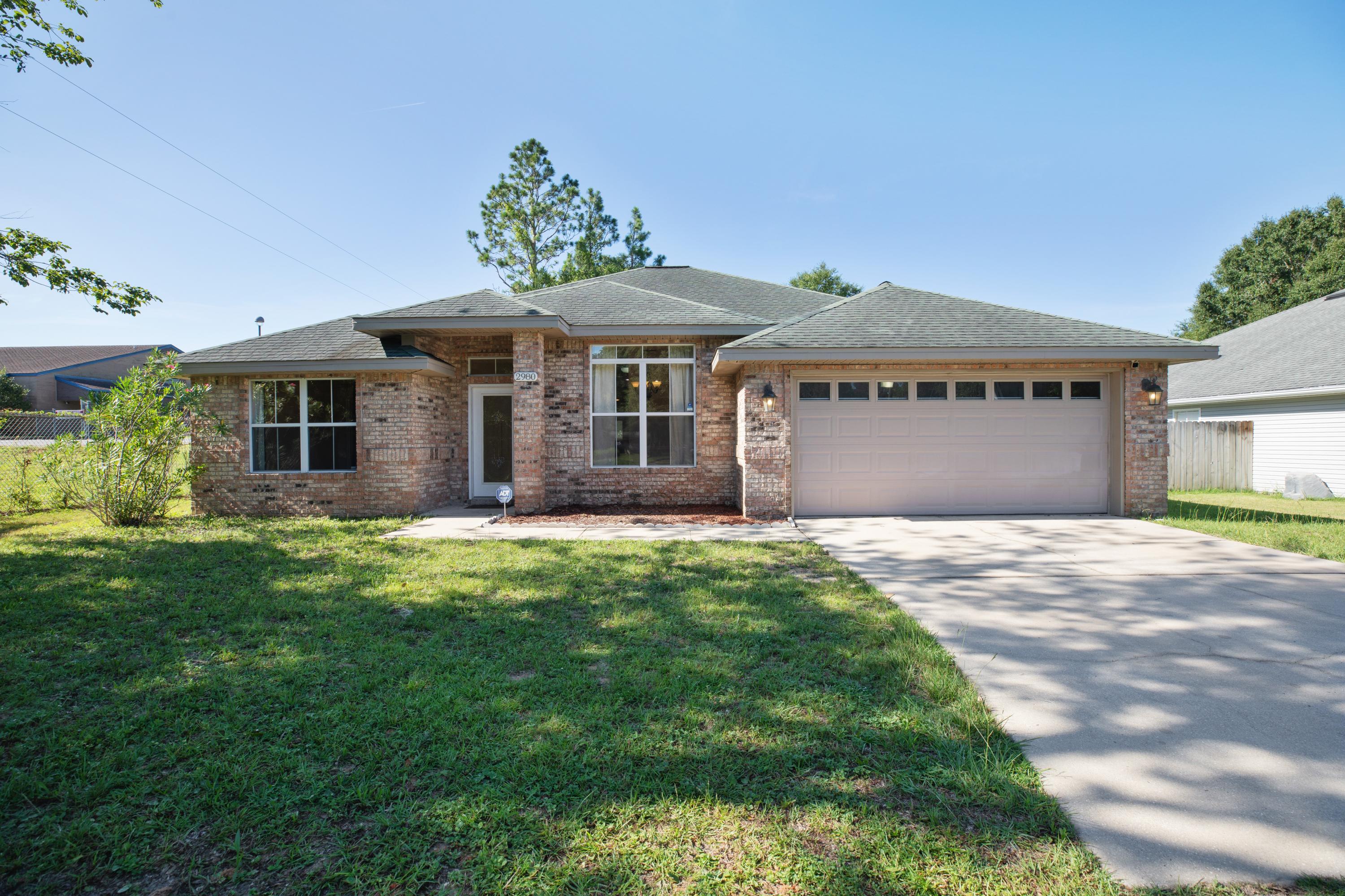 Welcome Home! This custom-built brick home in Trailwood Estates is perfectly located in the heart of Crestview - close to shopping & schools. As you enter the home, the formal dining room is located to the right with a view to the kitchen. The spacious kitchen has granite counters, beautiful custom maple cabinets, upgraded stainless steel appliances plus a breakfast bar area. The family/living area is spacious and features a gas fireplace. This split-bedroom floorplan offers four bedrooms and two bathrooms. Three of the bedrooms are located on the left side of the home. The master bedroom is located on the right side of the home and has a trayed ceiling, garden tub, double vanity and two walk-in closets. This home has a tankless hot water heater so you never have to