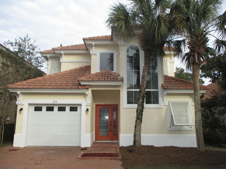 Fantastic location for this beautiful 2 story mediterranean styled REO home. Found in the gated community of Calusa Bay, this stucco home has new paint on inside and out, new appliances and fixtures, 1 car garage, and new HVAC. Built in 2001, this 3 bedroom 2 and 1 /2 bath home has tiled flooring in the downstairs laundry, pantry, kitchen and living room as well as in downstairs master bath and upstairs bath. If you are looking to be literally minutes from shopping at Destin Commons, or parking yourself on a beach towel at the beach this is it! Enjoy relaxing by the community after those long days at the beach! A definite must see. Call today!