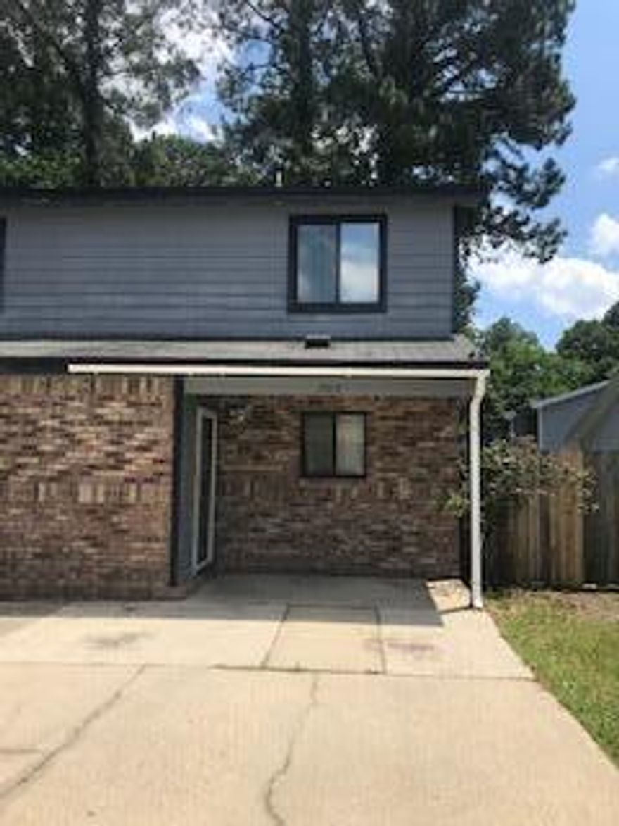 Great townhome with a fenced in back yard.   New paint and new carpet throughout.  2 bedrooms upstairs with a bath.  Kitchen, dining/living room with a 1/2 bath and a utility room on the first floor.  Sliding glass door leads out to your fenced in patio.  This townhome is close to both bases and the hospital.  No Association.  Yard building sold as is