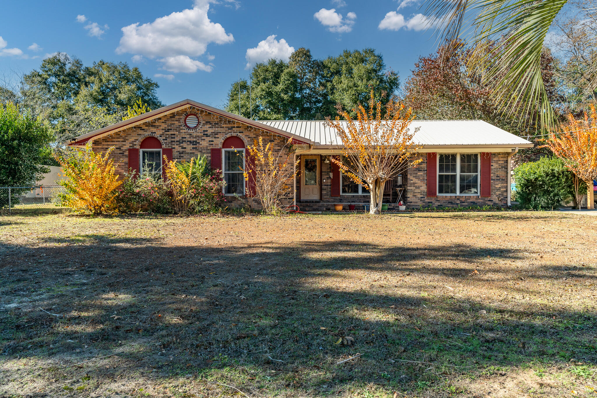 This home has charm & privacy as the home sits back off of the road., lots of trees in a serene setting.   Large & open kitchen with pantry, the massive size master bedroom can easily put a living room in there.  The rear yard is accessible with a gate and There is room to park a boat or a camper in the rear yard. 50 AMP plug in the back outside wall to 10 BREAKER Reliance transfer switch in Laundry room.Hvac 2016, HWH 2016 ,metal roof. 15 yrs.  Septic was last serviced 2021 with RId-X.