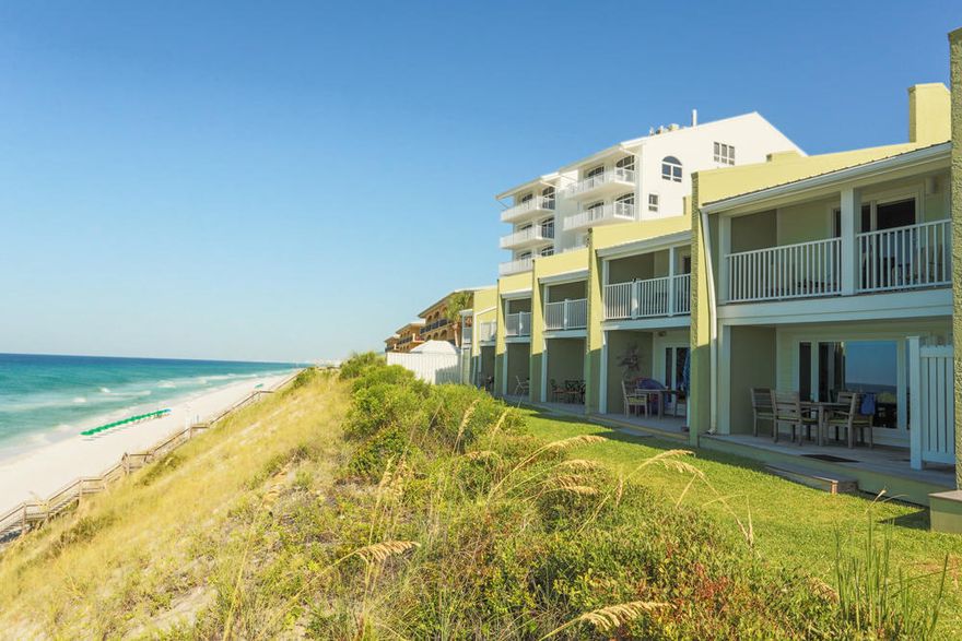 This classic beach townhouse enjoys an enviable position atop the highest bluff on the Gulf Coast of Florida! Enjoy fabulous views of the sea 365 days a year from your private patio and deck, as well as private beach access for just you and the 18 other owners at Sea Bluffs. The first floor is an open kitchen/living/dining area with full-on gulf views, tile floors, and granite tile counters in the kitchen. Upstairs are two spacious bedrooms with their own baths. The master suite enjoys a covered deck overlooking the water with porch swing - enjoy the beautiful blues and greens of the Gulf without a view of your neighbors! The master bath features double sinks. Home is being offered fully furnished...
