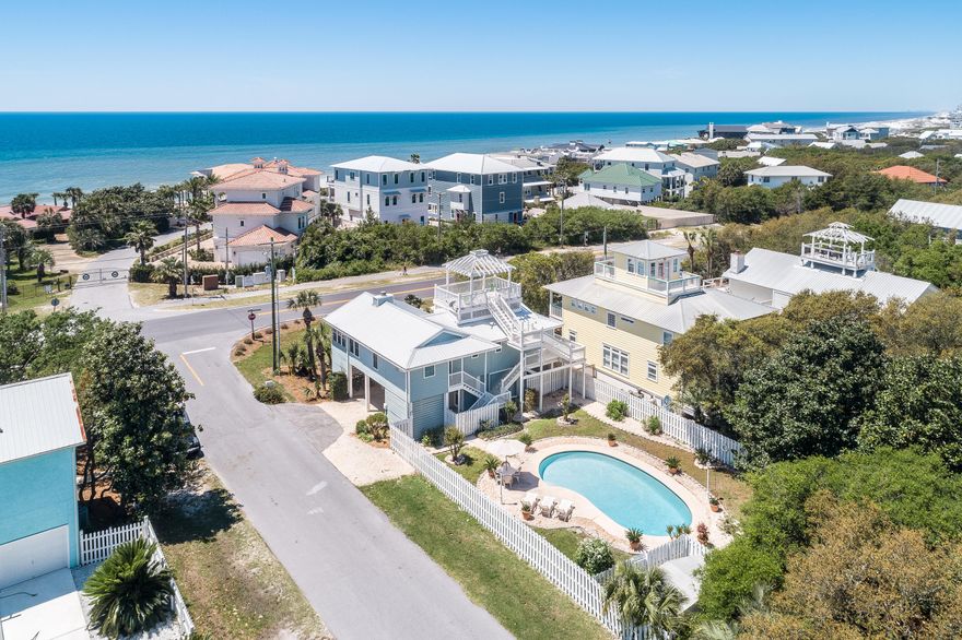 Amazing 30A location just across from the gulf! Traditional Florida bungalow for your escape to 30A.Fronting 30A and Seabreeze Ct, the large corner location offers bright natural light and gulf views. Enjoy the outdoor space with the privacy of a lush back patio and private pool. Plenty of covered parking and storage for beach toys & sporting equipment. No HOA and a short walk to the beach access! Rental ready with recent updates and ideal for full-time or your next family beach home! Nearby entertainment, boutique shopping and restaurants at the HUB in Watersound. Just a bike ride away down the scenic 30A bike path!