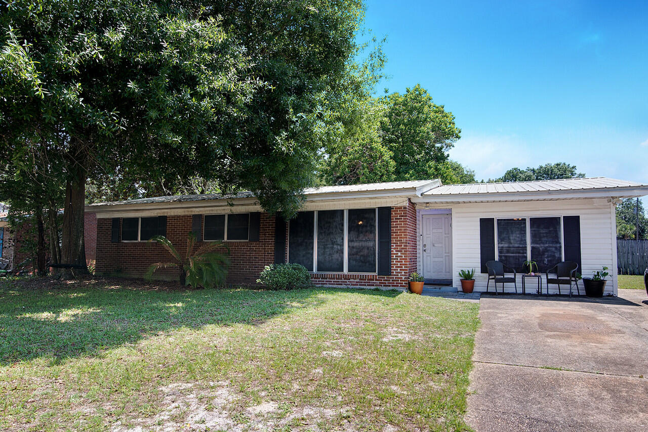 4 bedroom 2 full bath on a large corner lot with fenced back yard. Tile in the wet areas, LVP in living areas. The kitchen opens up to a dinning area that overlooks the spacious backyard. Come see this cozy house for yourself. Sqft is approximate and should be verified by the buyer.
