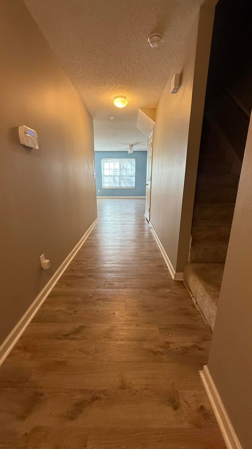 Welcome to this well-maintained 3-bedroom, 2.5-bath townhome located in the desirable Rolling Pines subdivision in Crestview. Built in 2006 and offering approximately 1,356 square feet of living space, this two-story home provides a functional layout, low-maintenance living, and a convenient location close to everything Crestview has to offer.  i1/4The first floor features a spacious open-concept living and dining area that flows directly into the kitchen, complete with a breakfast bar and plenty of cabinet space--perfect for everyday living or entertaining guests. A convenient half bath downstairs adds extra functionality for visitors.Upstairs you'll find three comfortable bedrooms, including a large primary suite with a private bathroom, plus an additional full bathroom.