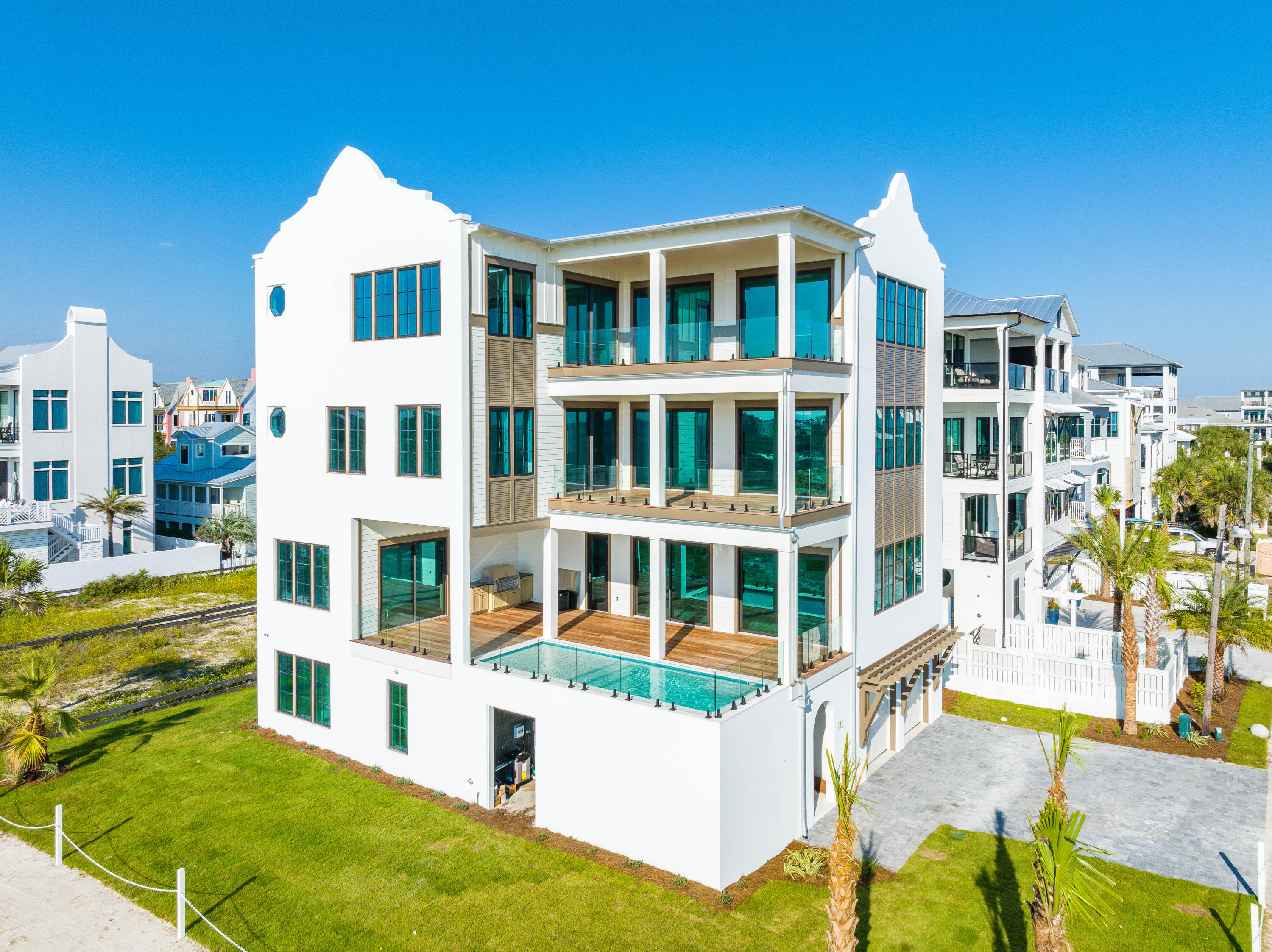 Under Construction- 91 Emerald Cove, blessed with forever Gulf-front views, is arguable one of the best lots on 30A. 91 Emerald Cove Lane is steps away from the emerald Gulf waters and sandy white beaches. This stunning new home was sure to capture that, with huge windows framing every inch of the gorgeous water views. The close walkover will take you directly to the water, and miles of the beautiful, sugar white sandy beach! This gorgeous home also boasts forever Gulf views. This brand-new build features over 6,875 square feet offers plenty of space for family and friends.Buyer to verify all information and dimensions. Information is deemed reliable but not guaranteed.