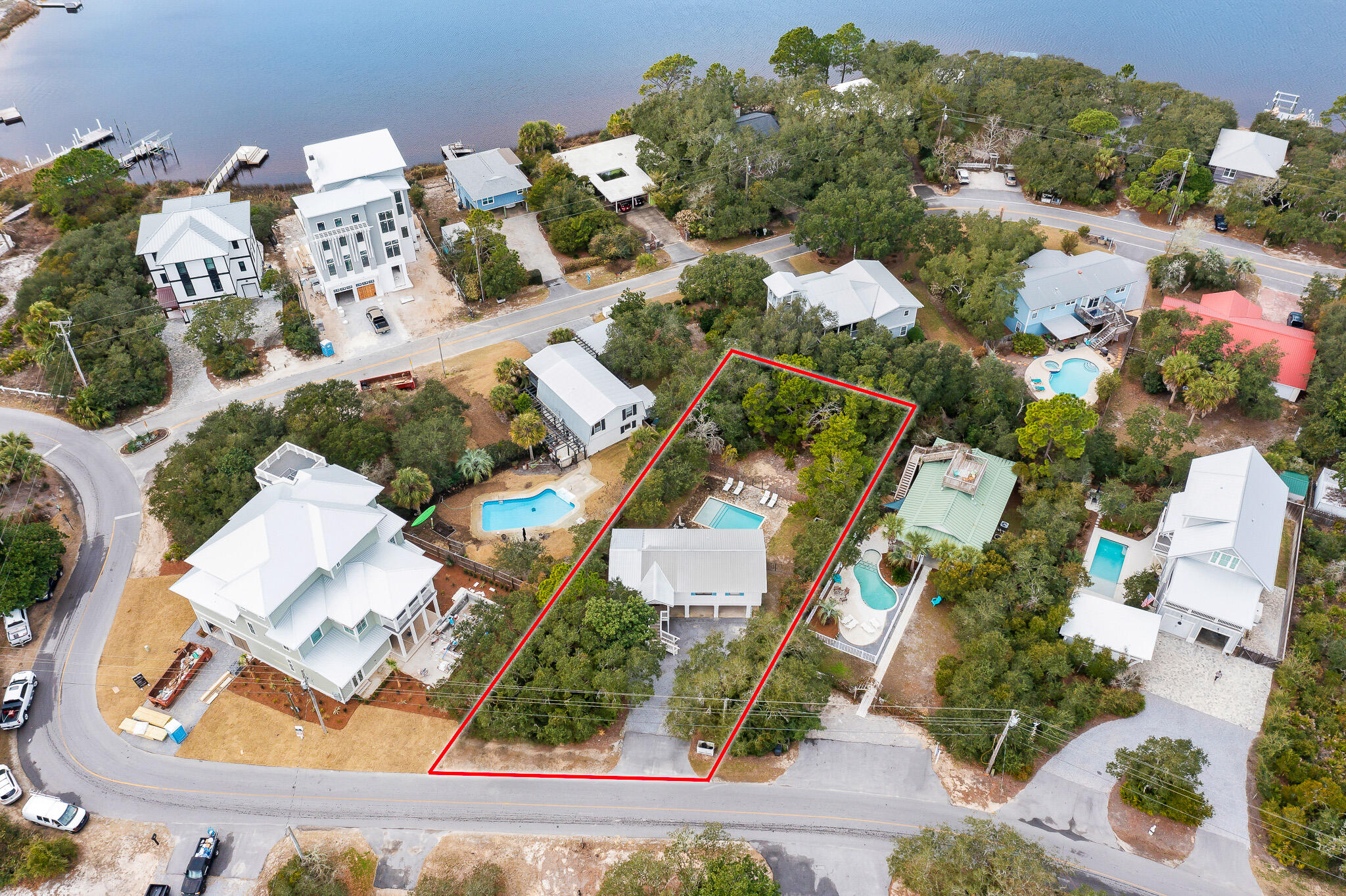 Completely remodeled in 2017, this Old-Florida beach cottage is located south of 30A in the desirable & charming Lakewood Community and just steps to the gulf. Nestled between Eastern Lake, Tresca Lake, and the Gulf of Mexico, 196 Lakeview embodies the picturesque natural beauty you think of when visiting 30A. Enjoy modern luxury with historic charm. This completely remodeled home features 3 bedrooms and 2 full baths with a large private pool and plenty of parking for 10+ vehicles. Positioned on a massive .35 acre parcel and completely in flood zone x, there is plenty of room for an addition to the home or adding a separate structure.