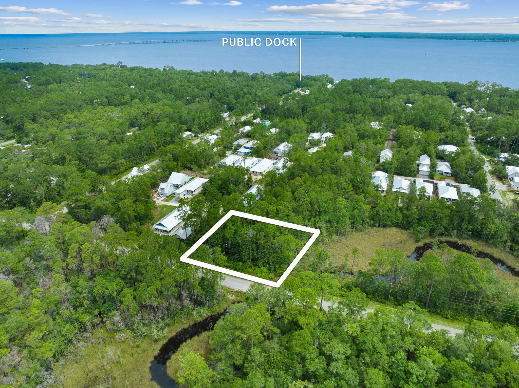 Welcome to the perfect opportunity to craft your dream home in the serene and idyllic neighborhood of Grayton Bayou. This picturesque community offers a host of amenities, including access to a refreshing community pool, a convenient public boat ramp, a scenic bayfront picnic area, and a charming community fishing dock - perfect for enjoying the great outdoors.The property comprises three combined lots - 22, 21, and 20 - providing an ample and versatile buildable footprint. Take advantage of this unique chance to create your own custom masterpiece tailored to your preferences and lifestyle.For those who value privacy and exclusivity, these lots boast private road access off Dawson Street, ensuring a tranquil and secluded ambiance for you to savor. Beyond the confines of Grayton Bayou, you'll discover an array of conveniences and delights just minutes away. From shopping and dining options to nature trails offering picturesque strolls, you'll find everything you need to complement your coastal lifestyle. And let's not forget the allure of the beautiful beaches of 30A, beckoning you to unwind and soak up the sun.
As with any property investment, conducting due diligence is essential, and the buyer will have the opportunity to ensure the suitability of this exceptional lot.
Don't miss out on this incredible chance to seize the essence of coastal living. Contact us today to uncover more details about this extraordinary piece of land waiting to become the canvas for your vision of the perfect home. Act now, and let your dream take root in Grayton Bayou.