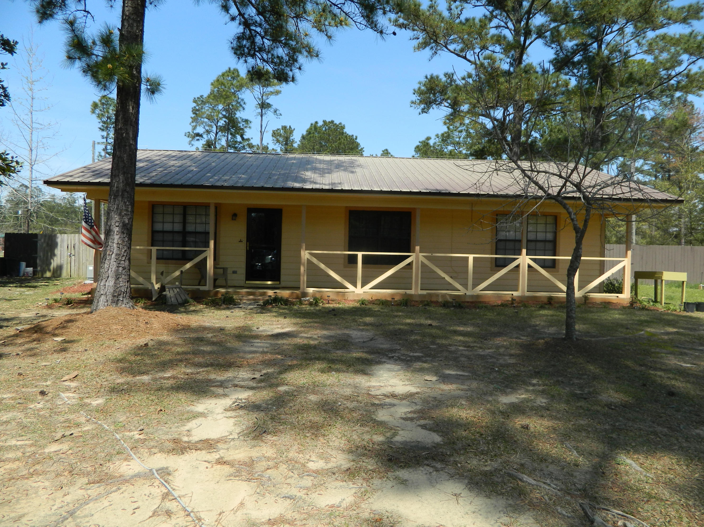 Country Oasis Convenient to everything in Defuniak Springs complete with renovated landscaping and interior. You will relish the Open floor plan, hardwood flooring, and elegant updated bathrooms. Master bedroom features HUGE full bath, with walk in closet. Pictures patio with the coy pond and fenced in privacy back yard. Garden area ready for you to plant. Buyers what are you waiting for????