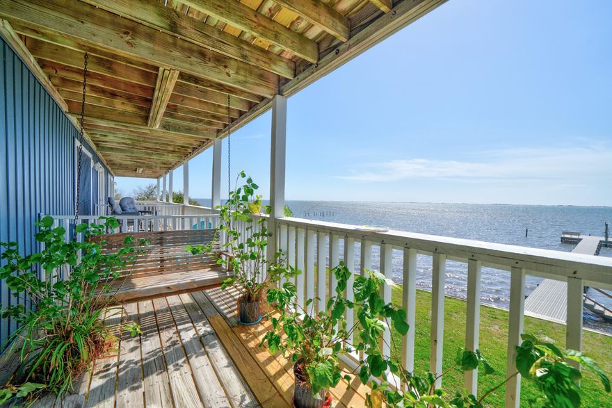Enjoy waterfront living at the end of desirable Soundside Drive with stunning views of Opal Beach and the Santa Rosa Sound. This 1-bedroom, 1-bath condo comfortably sleeps four and features LVP flooring, an eat-in kitchen, and a stackable washer and dryer--making it truly move-in ready.This charming 14-unit community completed major updates in 2021 including a new roof, exterior siding, paint, lighting, landscaping, and a beautifully updated through-flow dock with lighting. Each owner also has use of a 12x12 storage room maintained by the HOA.Conveniently located less than a mile from a public boat launch, 11 miles to Navarre Beach, and 15 miles to Pensacola Beach. Waterfront views, coastal charm, and a fantastic location--don't miss this one!