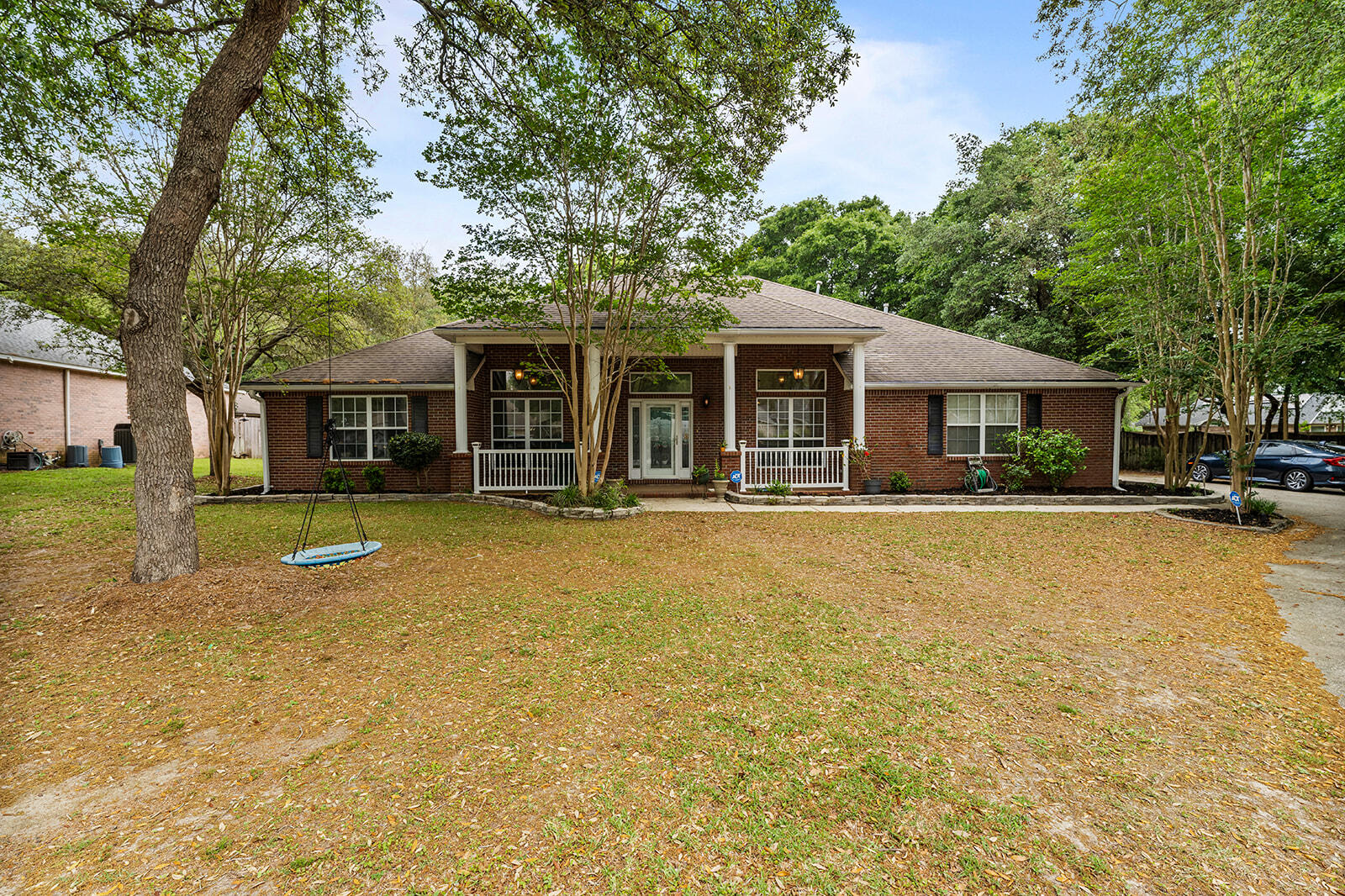 All brick 5 bedroom, 3 full bath. Crown molding compliments 10 ft+ ceilings. Chef's style kitchen, SS appliances, gas stove, dbl. oven & more. Tiled flooring in wet areas. Large master bath with garden tub, separate shower, double vanities & large walk-in closet. Enclosed, attached screened patio compliments the back of the home. Direct access to a full bathroom from inside the patio & a large gazebo in the center makes the back yard perfect for entertaining. Brick shop. Quiet subdivision with no HOA. Red lights at Live Oak Church Rd & John King intersections make access to & from Hwy 85 convenient. Seller to have new roof installed once under contract~ This home is perfect for your family and convenient to shopping, schools & dining~ This home offers comfort and elegance~