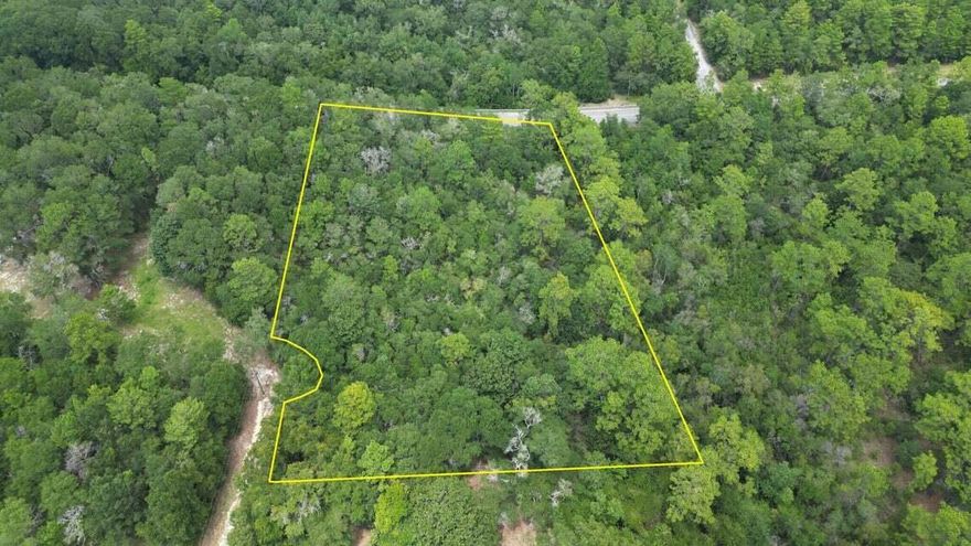This 1.74 acres provides serene country living in an area which is currently expanding providing more homes and job opportunities with new distribution centers, such as Amazon. The county has future plans for a 10K acre state park for future recreation. Examples of current recreation /  water sports: King Lake,  3 springs in neighboring town PDL, and the white beaches from Pensacola to Port St Joe. Short drive to local entertainment, shopping, eateries, not to mention the interstate access to other entertainment and Military bases.  Zoning is Rural Residential.1 unit per 2.5 acres The lot is raw ,no tap in fees have been paid, septic needed, public water & electric available. See photos for information PER the GIS Map for soils, flood zone , which is X, zoning, topo, & wetlands