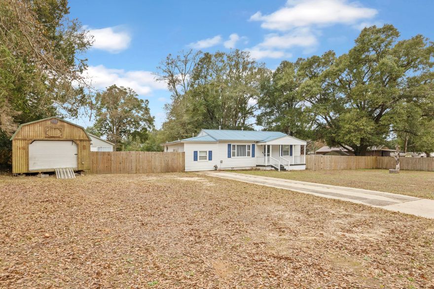 This 3 bedroom, 1.5 bath home offers 1,355 square feet of functional living space on a 0.43 acre lot. Built in 1955, the property blends classic construction with key system updates, including a metal roof, updated HVAC system, water heater, and electrical. The kitchen features stainless steel appliances, and the laundry area includes a front load washer and dryer. A privacy fenced backyard provides space for outdoor use, hobbies, or storage. A 14x40 detached workshop adds flexibility and includes a separate office space with its own heating and air unit, making it ideal for work, projects, or additional use. Conveniently located near shopping, dining, and major roadways. Professional photos coming soon.