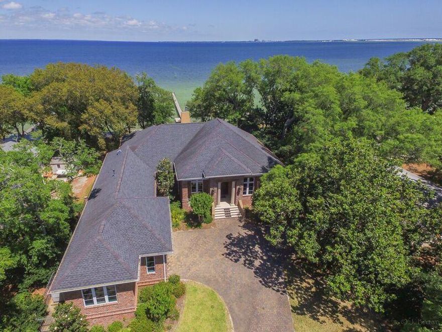 EXCEPTIONAL BAYFRONT RESIDENCE!!! Ideal location!!! 17 Bay Drive SE boasts expansive views of Choctawhatchee Bay from multiple rooms, living areas and outdoor kitchen/screened-in pool deck. This fine residence is nestled perfectly in the ever popular​, e​astern Ft. Walton Beach area with close proximity to downtown and Okaloosa Island. Supremely constructed with extensive extras, upgrades, custom work and materials that your family will enjoy with many years of comfort and memories. Some Interior features include: Italian tile and hardwood flooring, coffered ceilings with recessed lighting, custom/high-grade mill work throughout, granite countertops with large-wooden island in kitchen, 6 burner/2 door Professional Thermador gas stove, warming drawer, Sub-Zero refrigerator w