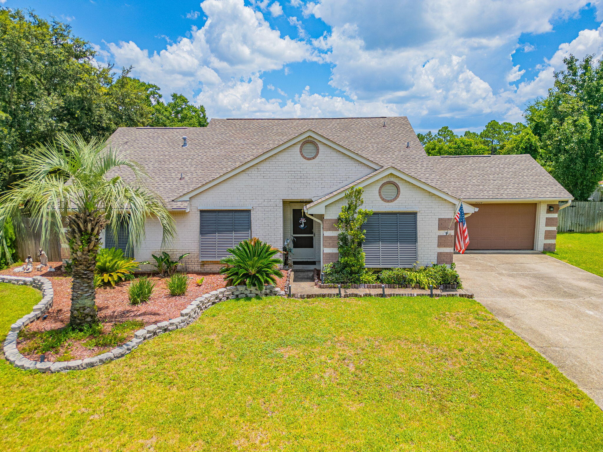 VA ASSUMABLE LOAN for qualified buyers at 2.25% and an option to finance the equity gap! Welcome to 9352 Vandivere, where sunshine meets coastal charm! This unique home is nestled in a quiet waterfront neighborhood with deeded water access and 5 minutes from stunning Navarre Beach! Featuring Bahama storm shutters, soaring ceilings and stylish LVP and Wood laminate floors, plus an updated kitchen with granite counters & newer Stainless Steel Appliances. The master suite will wow with a tiled walk in shower, garden tub, WC and double vanity. And the backyard? Big, fully fenced and ready for chillin', grillin', pups, or a pool. Only 8 miles to Hurlburt Field, with top-rated schools and shopping nearby; this home has ''Florida Dream'' written all over it. Don't miss out - paradise awaits.