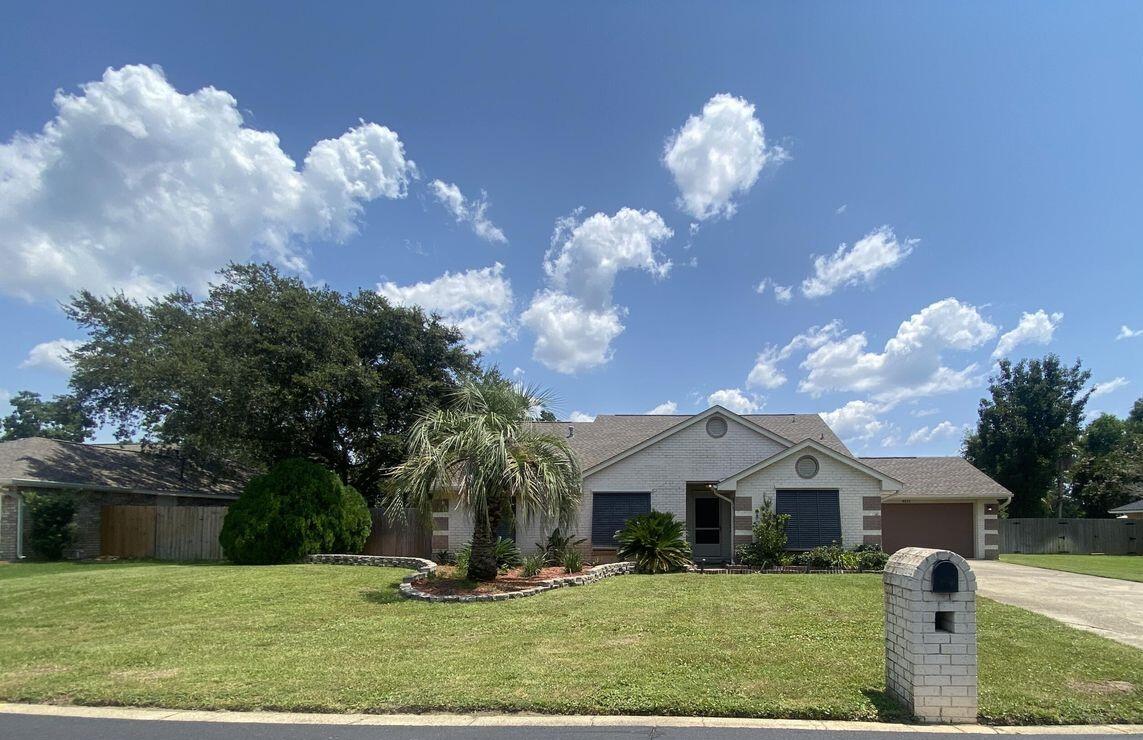 VA ASSUMABLE LOAN for qualified buyers at 2.25% and an option to finance the equity gap! Welcome to 9352 Vandivere, where sunshine meets coastal charm! This unique home is nestled in a quiet waterfront neighborhood with deeded water access and minutes from stunning Navarre Beach! Featuring Bahama storm shutters, soaring ceilings and stylish LVP floors, plus an updated kitchen with granite counters & newer Stainless Steel Appliances. The huge master suite will wow with a tiled walk in shower, garden tub & double vanity. And the backyard? Big, fully fenced and ready for chillin', grillin', pups, or a pool. Only 8 miles to Hurlburt Field, with top-rated schools and shopping nearby; this home will check the boxes and has ''Florida Dream'' written all over it. Don't miss out - paradise awaits