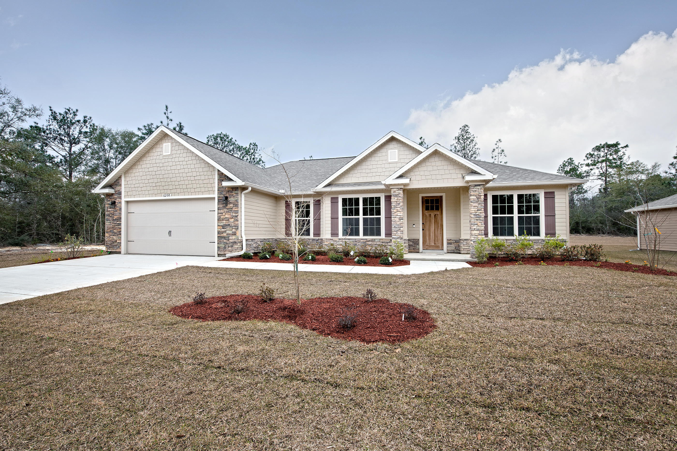 Contingency contract in place with a 72 hour first right of refusal. Award winning builder, and you will win with this floor plan! From the Stone Fireplace, Tile flooring, Granite kitchen countertops and large Lanai you will want to call this home. The Master suite offers tray ceiling, gracious walk-in closet, dual vanities with spa sinks, garden tub and separate shower. Grand family room with wood flooring, that opens up to the kitchen and dining room. Inside laundry room with utility sink with access to the garage. Decorative Columns, cedar shake siding and stone accents the exterior of the home. 2'' Faux wood blinds to be installed prior to closing. Seller will pay $3000 of buyers closing costs with the use of a preferred lender