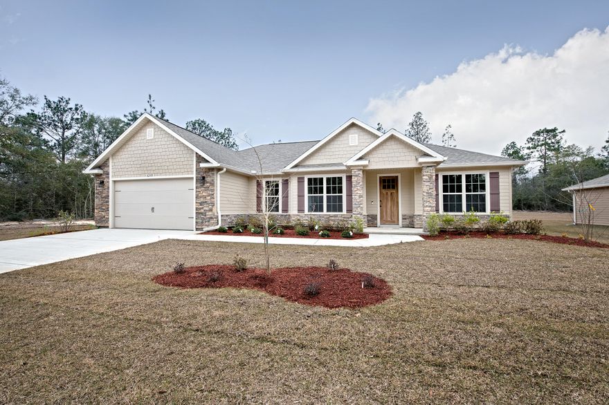Contingency contract in place with a 72 hour first right of refusal. Award winning builder, and you will win with this floor plan! From the Stone Fireplace, Tile flooring, Granite kitchen countertops and large Lanai you will want to call this home. The Master suite offers tray ceiling, gracious walk-in closet, dual vanities with spa sinks, garden tub and separate shower. Grand family room with wood flooring, that opens up to the kitchen and dining room. Inside laundry room with utility sink with access to the garage. Decorative Columns, cedar shake siding and stone accents the exterior of the home. 2'' Faux wood blinds to be installed prior to closing. Seller will pay $3000 of buyers closing costs with the use of a preferred lender