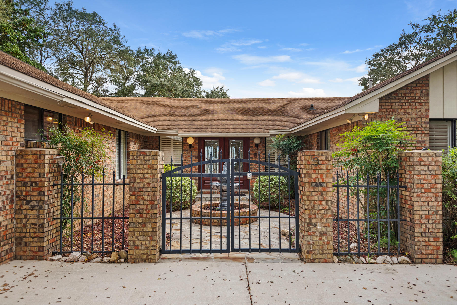 You'll fall in love with this spectacular, waterfront estate set on a half-acre surrounded by mature landscaping and majestic water oaks, which make the perfect addition to the panoramic views over the Choctawhatchee Bay. This 5 bedroom, 3 bath all brick home with 2-car garage offers 3109 square feet of peaceful living. Wake up each morning to awe-inspiring sunrises in the east and enjoy the breathtaking sunsets on your screened in patio each night. This home welcomes you through iron gates and newly refurbished double wood and decorative glass etched doors into one of two living space with warm hardwood floors. With raised ceilings in most rooms, accented by crown moulding, the entire home is open and airy. The kitchen was remodeled a few years back with granite countertop, stainless ....