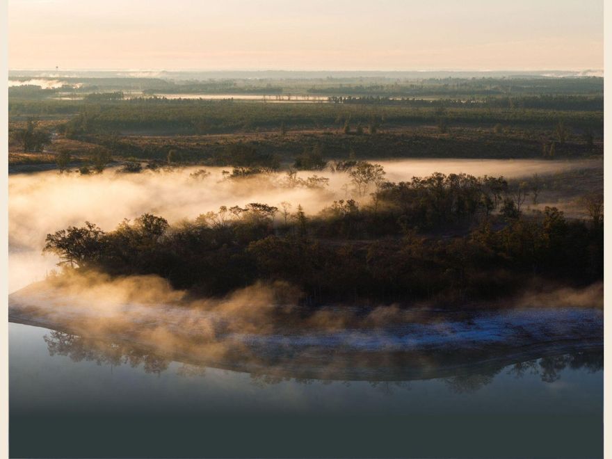 Located in Florida's panhandle, just inland from the gulf's sugar sand beaches, Old Shores will be a new community anchored by golf - a refuge, with world-class courses, accommodations, and homesites. Located just 30 minutes north of Panama City Beach, the land will serve as a peaceful, secluded escape and is an easy day drive from a wide variety of neighboring cities and states. The bluffs and moss-draped oaks of Old Shores form an inviting and natural setting for a walking village that opens to the unspoiled golf sites and a vast forest with lakes for fishing and exploring. This new expression of golf by Michael Keiser will change the way you look at Florida. The initial course, by Tom Doak, is underway, with another in design.