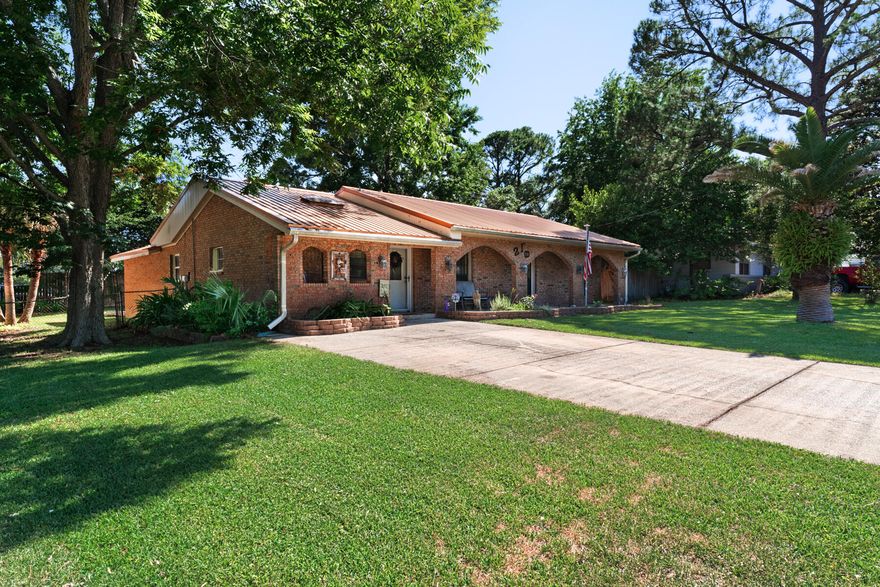 This homey and inviting 4 bedroom 2 bathroom home sits right off miracle strip parkway and close to downtown Fort Walton Beach. The neighborhood offers a central location to the great dining options within Fort Walton area. The home is also across the street from Lisa Jackson park just a short stroll away. The property sits on a quarter of an acre with a fenced in backyard. The backyard also includes an enclosed shed. The home is less than a mile from the local elementary school, middle school, and high school making a great primary residence for a family children.