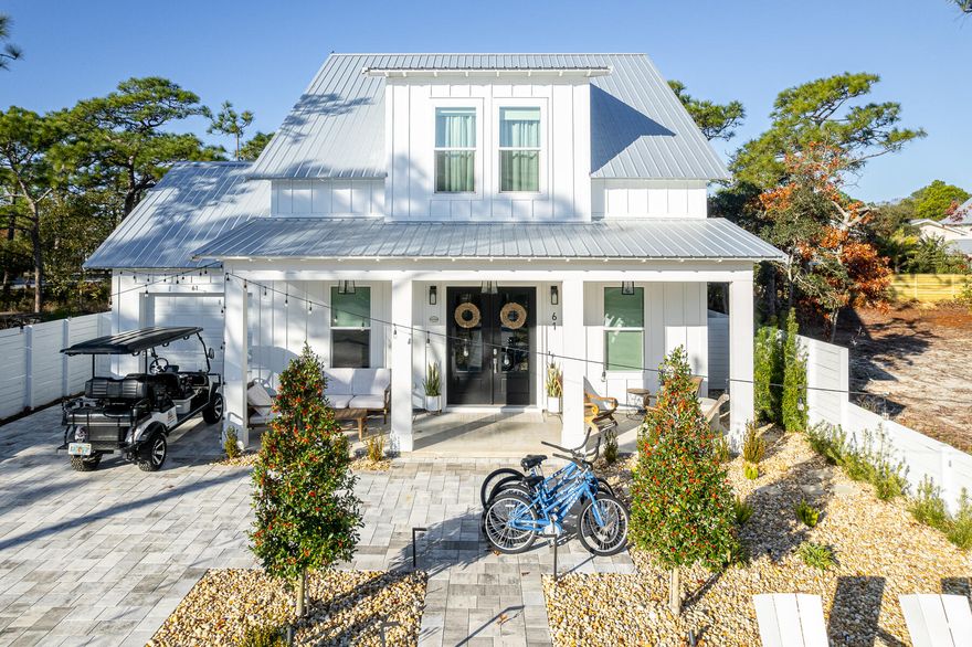 Charming Florida Cottage just 2 blocks North of 30a.  Bike, golf cart or walk to the public beach at San Juan or Santa Clara.   This property was built in 2022 and features 4 Ensuites, with 2 bedrooms and baths downstairs and 2 bedrooms and baths upstairs. Sleeps 10.   The open kitchen and living area is situated perfectly for you and your guests to enjoy a casual day after returning from the beach. Sold fully furnished and No HOA fees.  The yard is fenced and  is large enough for a large pool.