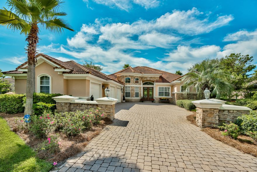 Step into spaciousness and style! This upscale home in beautiful Stonebridge has a fantastic open floor plan making it great for entertaining. Not only is it on a large and private .61 acre lot with views of the 17th fairway of Kelly Plantation, it also offers an oversized pool, travertine floors, granite counters, Kitchenaid stainless steel appliances, a luxurious and tranquil master bedroom/bath, two car garage and golf cart garage. Other features include raised, trayed, and coffered ceilings, crown molding, indoor/outdoor built-in Surround Sound, and gas fireplace. The study boasts built in bookshelves and bamboo flooring. The house has Rhinoshield stucco epoxy coating, a security system, and a Beam central vacuum system. See more under Documents tab with the listing.