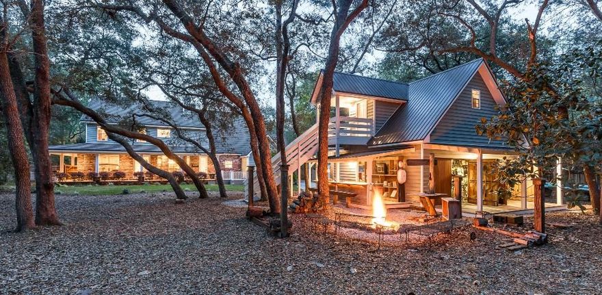 INCREDIBLE custom built home with a full guest suite as well as a 24'x24' garage/workshop on a half-acre lot in Rocky Bayou Estates. This gorgeous home with its charming wrap around porch was built using reclaimed Old Chicago brick giving it a timeless look. When you enter the home through the beautiful front door you will be in the welcoming foyer. To the right is the study with French doors for privacy and to the left is the formal dining room with a built in serving buffet including a wet bar. Continuing through the foyer you will find yourself in the family room accented by a brick wall with display niche's surrounding the gas fireplace. The family room is open to the kitchen and breakfast nook. The chef's kitchen features custom cabinets, granite counters, black appliances