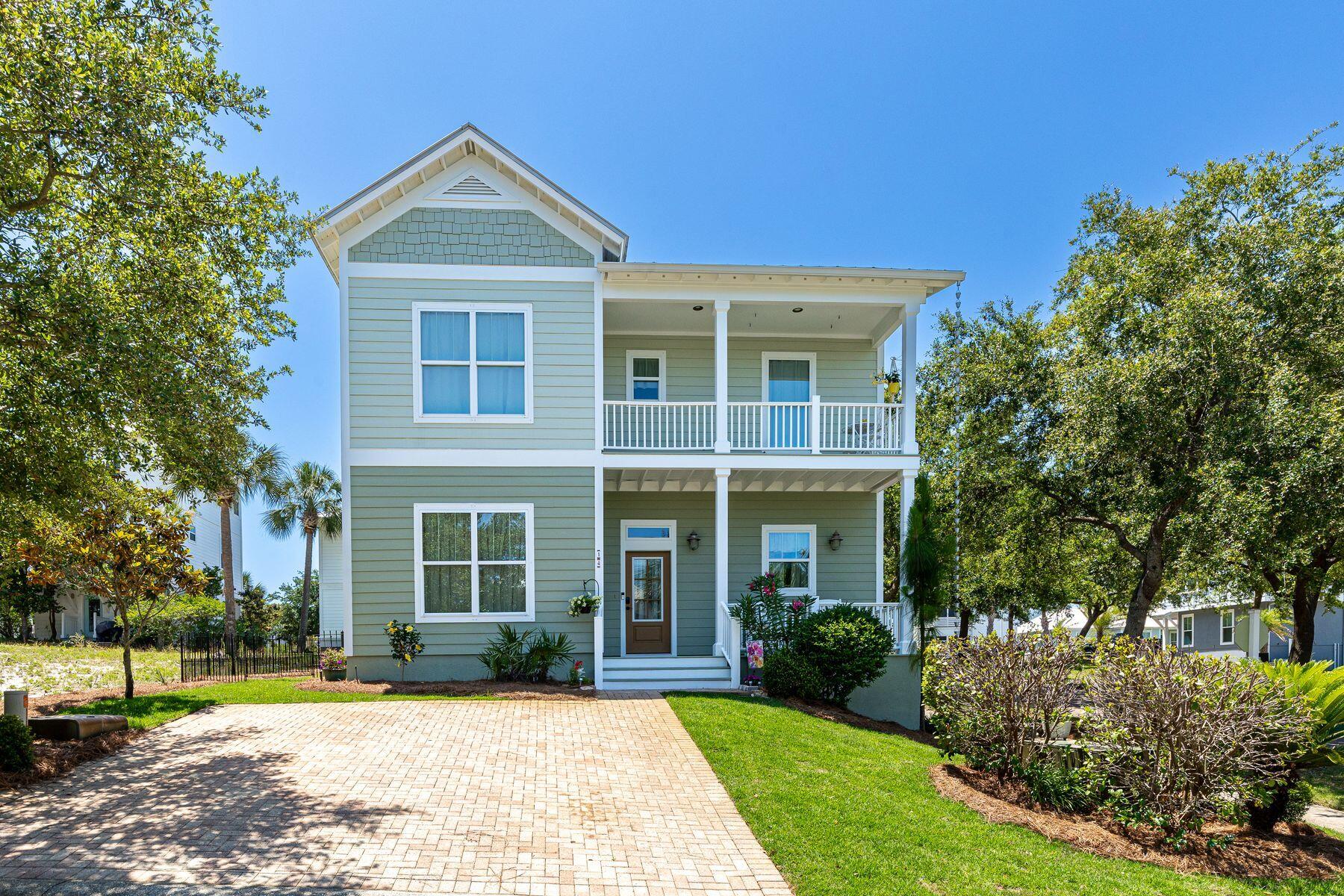 Tucked away in the coveted Village at Blue Mountain Beach community, this meticulously maintained 3 bedroom home beckons with its coastal charm. Step inside to discover a haven of comfort and style, where new LVP flooring graces two levels of inviting living space. The first-floor is designed for ease of gathering with family and friends. Granite countertops, new tile backsplash, plentiful cabinet storage, and stainless-steel appliances adorn the kitchen, while a breakfast island invites gatherings and conversation. The spacious great room and kitchen have two doors leading outside to the pavered patio where the backdrop for memorable gatherings is set with garden lights, table and chairs, herb garden, and potted flowers. Upstairs the primary bedroom with double tray ceiling, has a broad private balcony for curling up with a book to enjoy salty breezes. The primary bathroom offers a jetted tub, separate shower, water closet and walk-in closet. Two guest bedrooms, a queen bedroom and one with a twin over full bunk bed, round out the second floor and share a full bathroom with a tub shower combination. The home is move-in ready, as furnishings convey, and the next owner will enjoy having a new washer/dryer, a freshly painted exterior, new exterior doors, new flooring and blinds as well as a 2-year old air conditioner.
Owners and guests of this gated community enjoy access to a wealth of amenities, including a pool, exercise room, picnic area, and recreational activities like bocce ball and shuffleboard. With two nearby beach accesses, the pristine sands of Blue Mountain Beach are just moments away, offering endless opportunities for relaxation and recreation. Convenience is key in this prime location, with popular dining destinations such as Mimmo's a block away and Cowgirl Kitchen and Redfish Taco right down the road. This beach cottage is the perfect opportunity for primary living on the coast, a vacation home or a rental investment. Don't miss your chance to make memories in this idyllic setting.