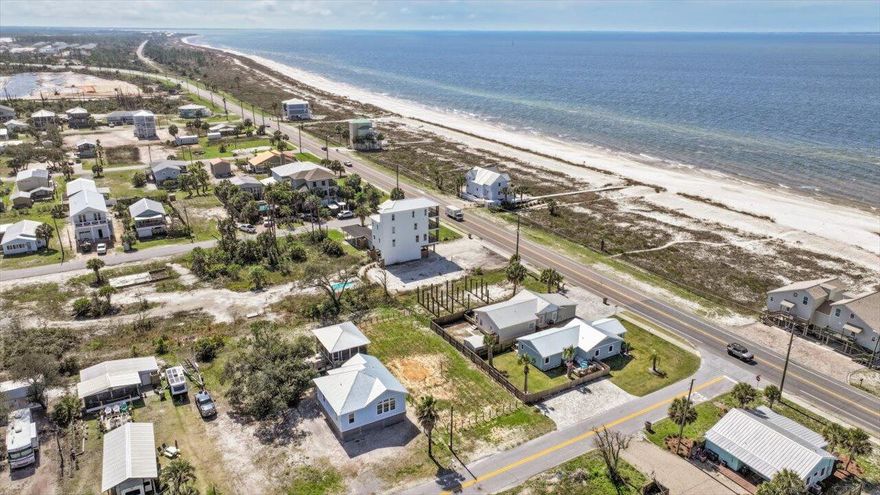 Gulf views at a value price! Just across from Beach! This lovely lot will have the view we all wish for! Flood zone is AE which is great for being sooo close to water. This lot is vacant and ready to build on now!